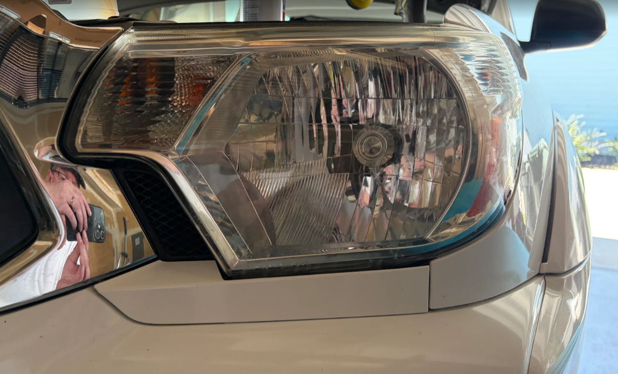 Silver SUV headlight — after restoration