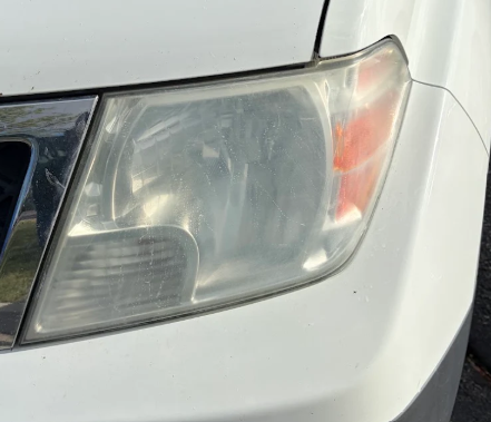 Cloudy truck headlight before restoration